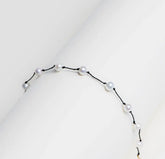Bracelet perles blanches fil noir - Paris-Rennes | Maison Diaphane