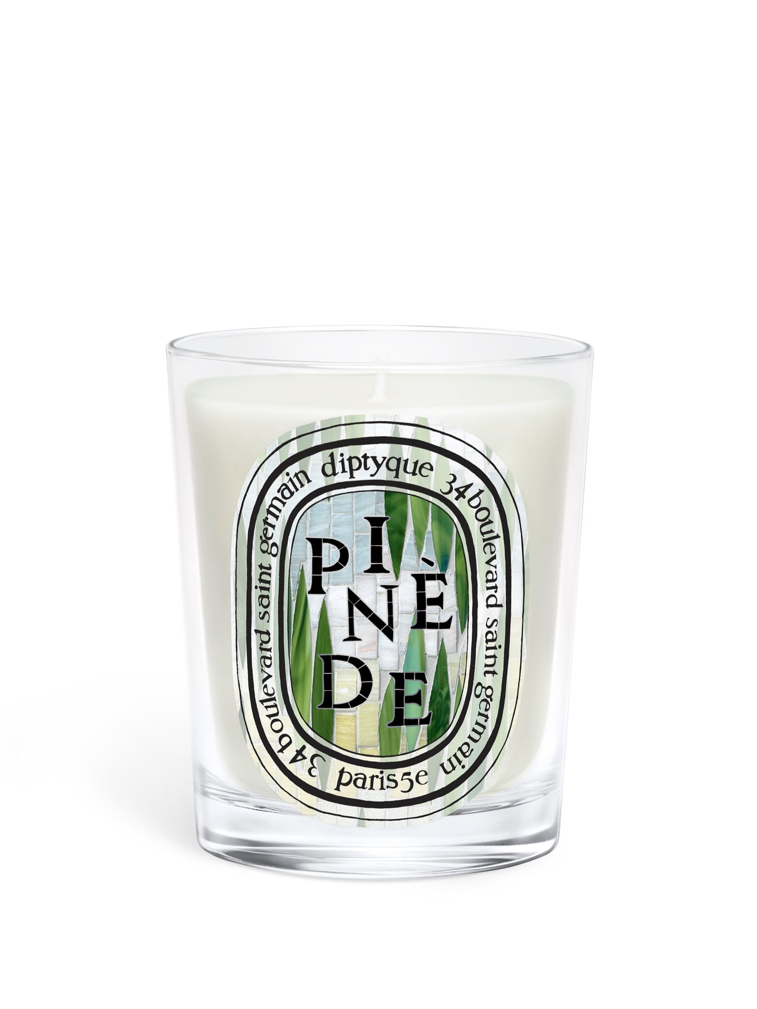 Bougie Pinède Diptyque édition estivale dans son verre transparent et son étui décoré d’une mosaïque végétale verte inspirée d’un jardin méditerranéen, Maison Diaphane.