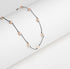Collier PARISRENNES avec perles olives rosées et fil noir au design minimaliste et lumineux Maison Diaphane