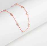 Collier perles olives rosées fil rouge fluo - Paris-Rennes | Maison Diaphane
