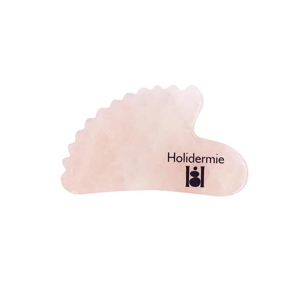 Gua sha sculptant corps en quartz rose - Holidermie | Maison Diaphane