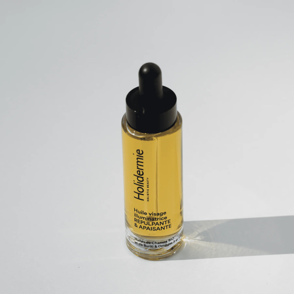 Huile visage illuminatrice trio chanvre, camélia et buriti - Holidermie | Maison Diaphane
