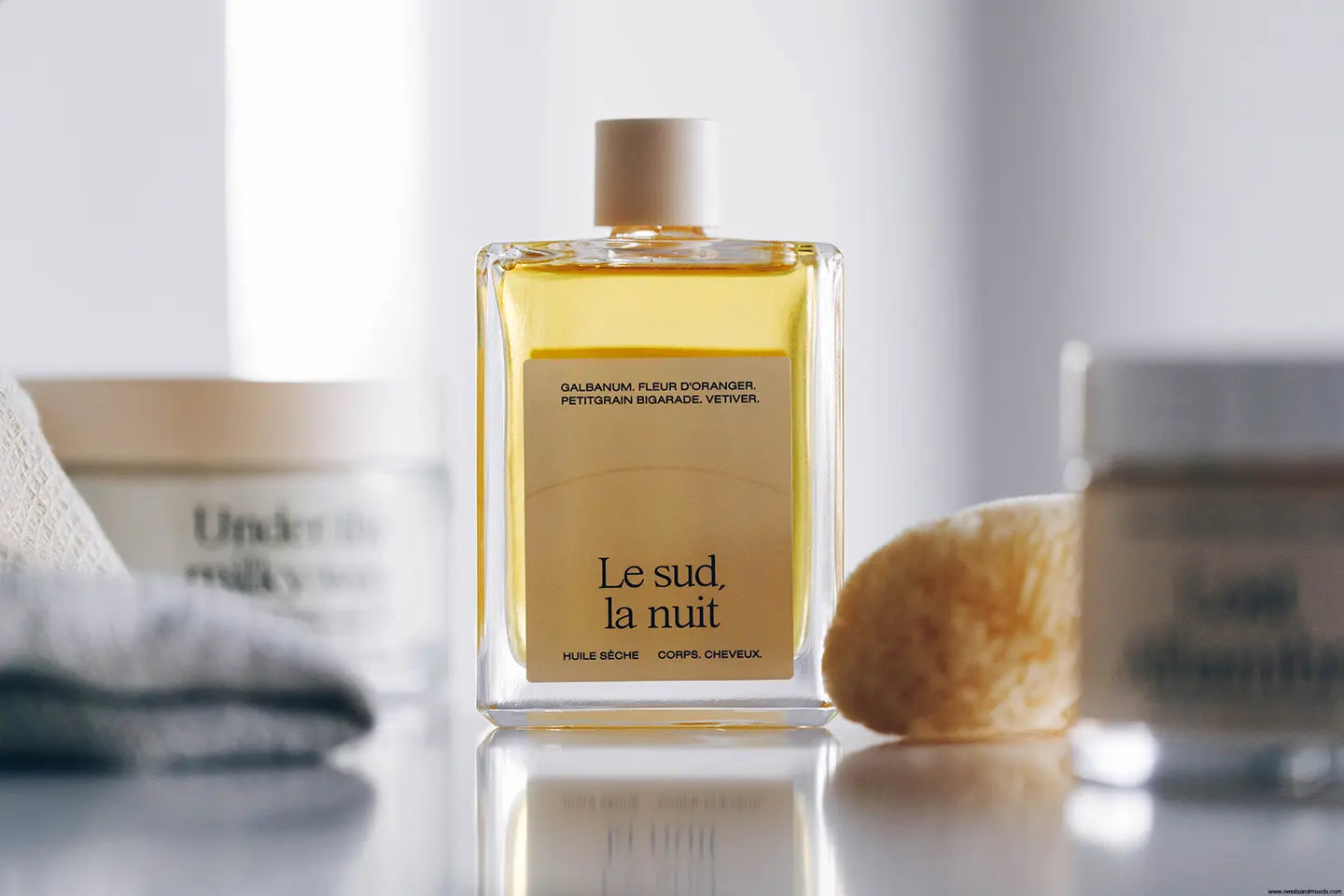 Soins parfumés Re.feel associant bien-être sensoriel, textures expertes et fragrances signatures disponibles chez Maison Diaphane